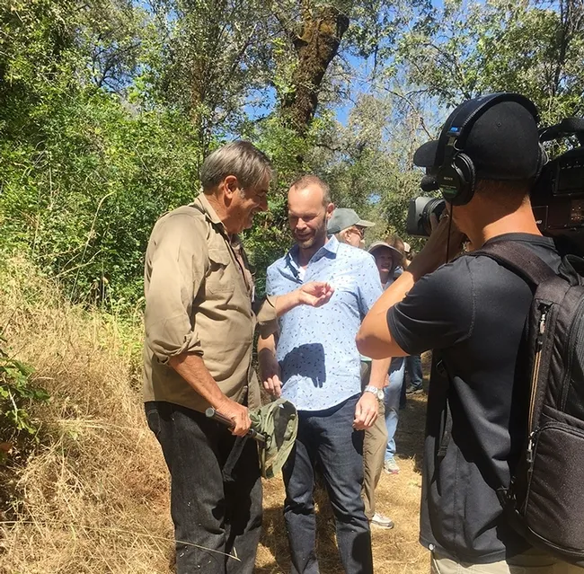 California dogface butterfly expert Greg Kareofelas (far left) chats with Rob Stewart of the PBS program, "Rob on the Road."