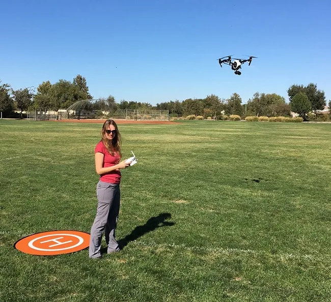 Entomologist Elvira Lange utilizing a drone. Agricultural drones, she said, are "highly versatile and have great commercial potential."