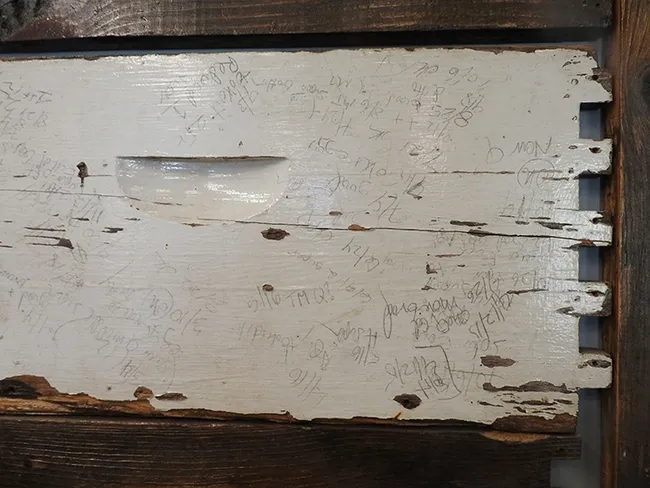 A close-up of Ishai Zeldner's bee boxes in The Hive, Woodland. He documented his work on the bee boxes. (Photo by Kathy Keatley Garvey)