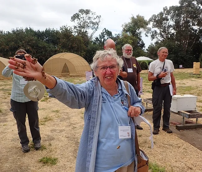 Petaluma beekeeper Ettamarie Peterson holds some newly emerged bees at a Randy Oliver demonstration at the 2007 Western Apicultural Society tour of the Harry H. Laidlaw Jr. Honey Bee Research Facility at UC Davis. (Photo by Kathy Keatley Garvey)