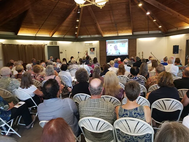 A capacity crowd attended the memorial for UC Extension apiculturist Eric Mussen in the Putah Creek Lodge, UC Davis. (Photo by Tabatha Yang)