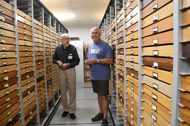 Entomologist and butterfly collector Bill Patterson chats with entomologist Jeff Smith, curator of the Lepidoptera collection at the Bohart Museum, during the international Lepidopterists' Society meeting in 2017 at UC Davis. Both are recipients of the CA&ES Friend of the College Award: Patterson in 2022, and Smith in 2015. (Photo by Kathy Keatley Garvey)