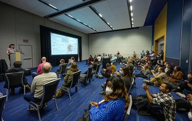 A large crowd listened to UC Davis doctoral candidate discuss her research, “The Mechanism Behind Beneficial Effects of Bee-Associated Fungi on Bumble Bee Health." (Photo courtesy of ESA)