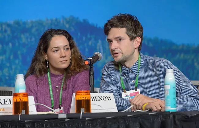 In the preliminaries, UC Davis doctoral candidate Zach Griebenow answers a question while team member, UC Davis doctoral candidate Erin "Taylor" Kelly waits for her turn. (Photo courtesy of ESA)