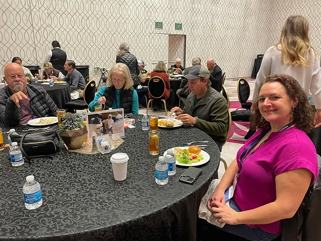 Extension apiculturist Elina Lastro Niño (foreground at right) helped coordinate the CSBA luncheon memorializing Eric Mussen. A member of the UC Davis faculty since 2014, she is also the director of the California Master Beekeeper Program. (Photo by Brooke Palmer)