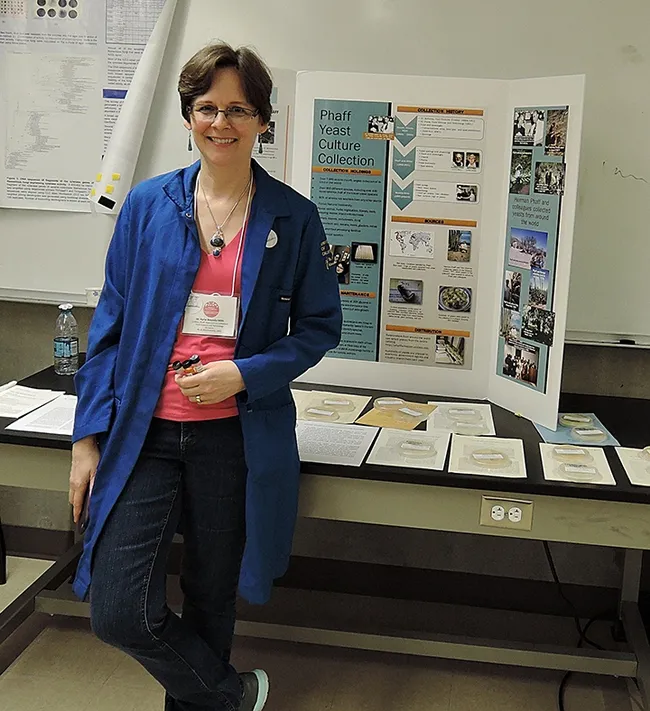 Research microbiologist Kyria Boundy-Mills, curator of the Phaff Yeast Culture Collection, is ready to answer questions. (Photo by Kathy Keatley Garvey)