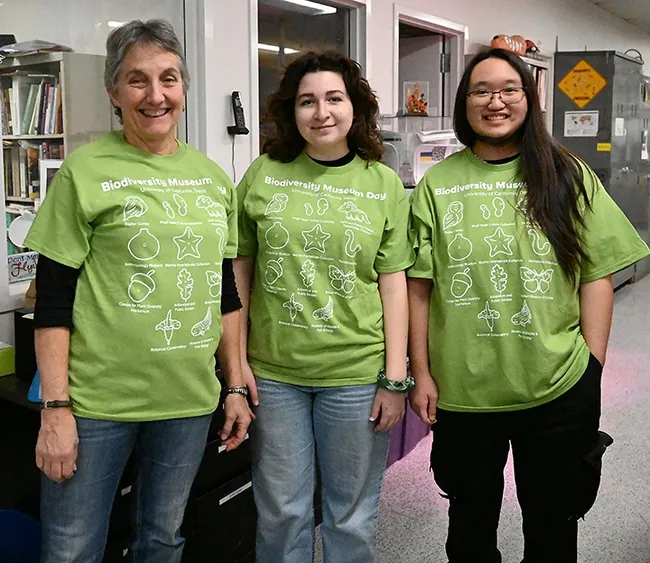 Wearing of the Green--Ready to greet the crowd at the Bohart Museum of Entomology on Feb. 18 are (from left) Lynn Kimsey, director of the Bohart Museum of Entomology and a UC Davis distinguished professor of entomology, and entomology students and Bohart associates, Sol Wantz, president of the Entomology Club, and Allen Chew. (Photo by Kathy Keatley Garvey)
