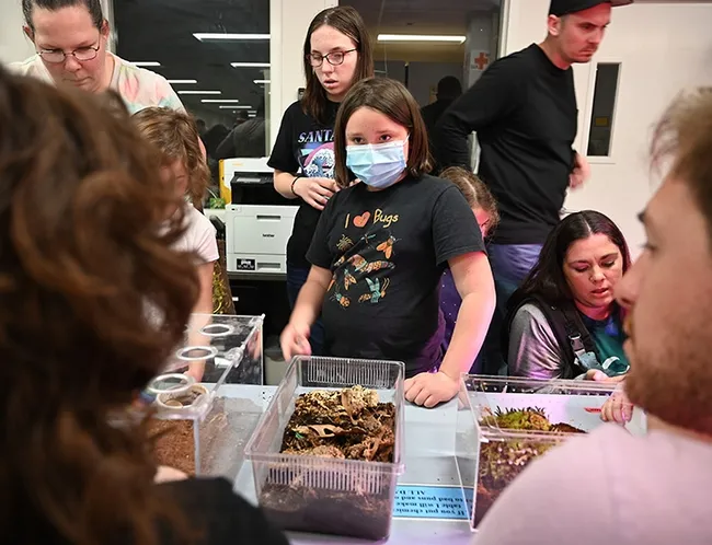 Insect enthusiast Rose Hager, 9, of Davis, wore her "I Love Bugs" t-shirt. (Photo by Kathy Keatley Garvey)
