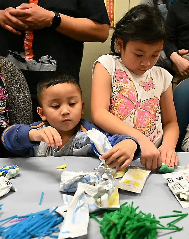 Aidan Laurel 3, and sister, Riley Laurel, 7 of Vacaville decide what to make. (Photo by Kathy Keatley Garvey)