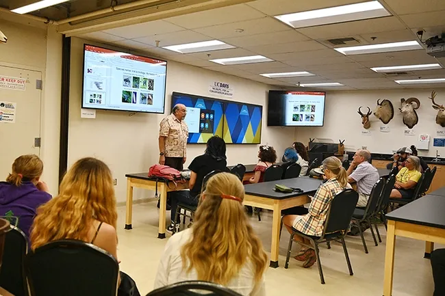 Forensic entomologist Bob Kimsey fields questions following his 45-minute talk. The Bohart Museum of Entomology's open house was themed "Forensics and Insects." (Photo by Kathy Keatley Garvey)