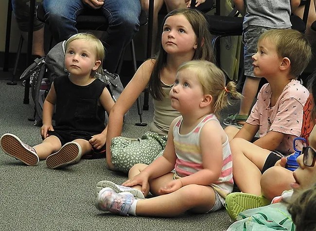 The Bohart Museum of Entomology
insect presentation fascinates these youngsters at the Vacaville Public Library. (Photo by Kathy Keatley Garvey)