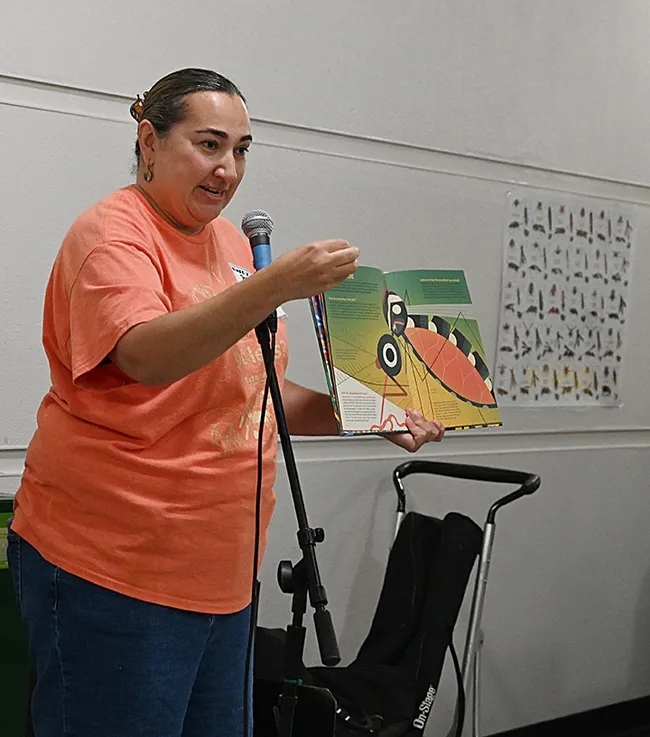 Nazzy Pakpour discusses fascinating facts about mosquitoes, lice, wasps, cockroaches, fleas, and bedbugs. She was a special guest at a Bohart Museum of Entomology open house. (Photo by Kathy Keatley Garvey)