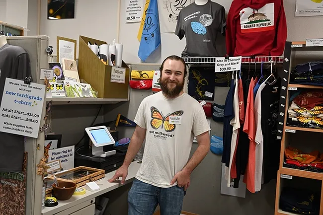 Brennen Dyer, the Bohart Museum's collection manager, stands in front of the gift shop. (Photo by Kathy Keatley Garvey)