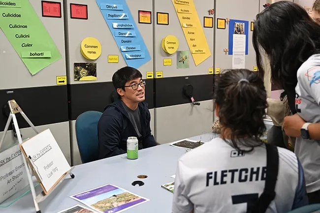 Community ecologist Louie Yang, professor, UC Davis Department of Entomology and Nematology, answers questions at a Bohart Museum of Entomology open house on "Monarchs and Milkweed." (Photo by Kathy Keatley Garvey)