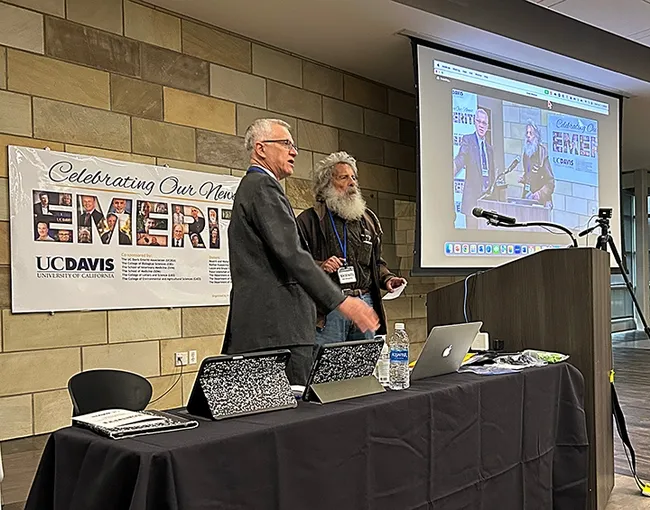 UC Davis distinguished professor Walter Leal (left), organizer and host of the emeriti celebrations, introduces UC Davis distinguished professor emeritus Art Shapiro, known as "the butterfly guru."