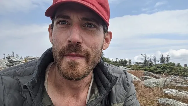 Honey bee scientist Zac Lamas, a National Institute of Food and Agriculture (NIFA) postdoctoral fellow with the USDA's Agricultural Research Services.