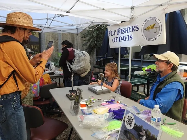At the end of a mini-session with Paul Berliner (right) of the Fly Fishers of Davis, it's family photo time. (Photo by Kathy Keatley Garvey)