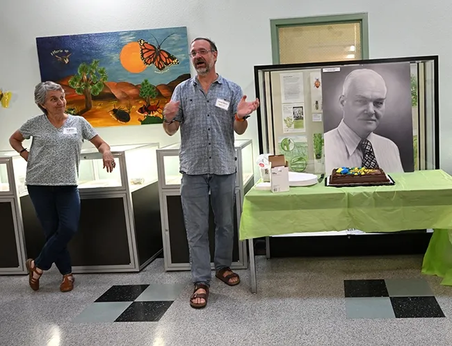 Bohart Museum director Professor Jason Bond addresses the crowd, with former director Lynn Kimsey, now a UC Davis distinguished professor emerita. Bond is the Evert and Marion Schlinger Endowed Chair, UC Davis Department of Entomology and Nematology, and associate dean, UC Davis College of Agricultural and Environmental Sciences. (Photo by Kathy Keatley Garvey)