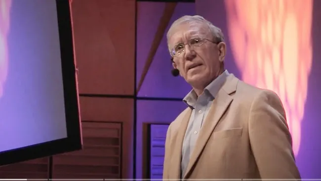 Michael Hoffmann is shown here presenting a TEDX Talk, titled "Climate Change: It’s Time to Raise Our Voices." (Screen shot from YouTube)