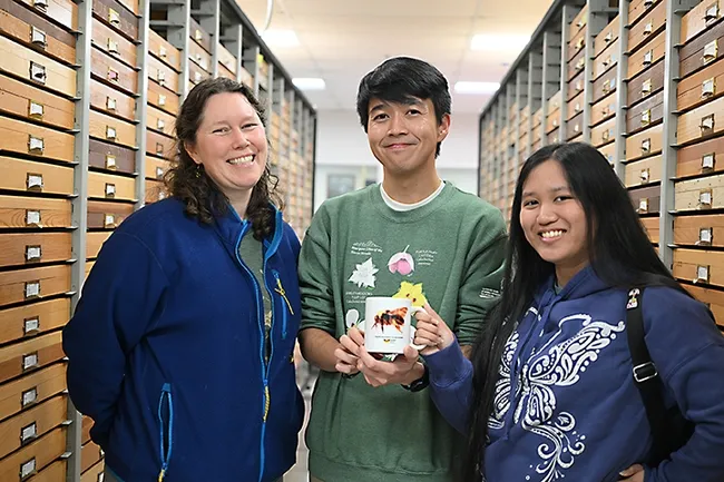 Tabatha Yang (left), education an outreach coordinator of the Bohart Museum of Entomology with the contest winners Michael Kwong an Kaylen Teves. (Photo by Kathy Keatley Garvey)
