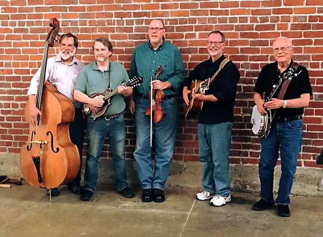 Bruce Eldridge loved to play bluegrass on his banjo. This image, provided by UC ANR retiree Jim Coats, shows Mark Brothers (bass and guitar), Jim Coats (mandolin), David Riggs (fiddle), Ken Eldridge (guitar), and Bruce Eldridge (banjo). Others performing occasionally: Jeremy Brothers (bass) and Don Meyer (bass). Coats, principal editor for UC ANR Communication Services and Information Technology, retired in 2015.