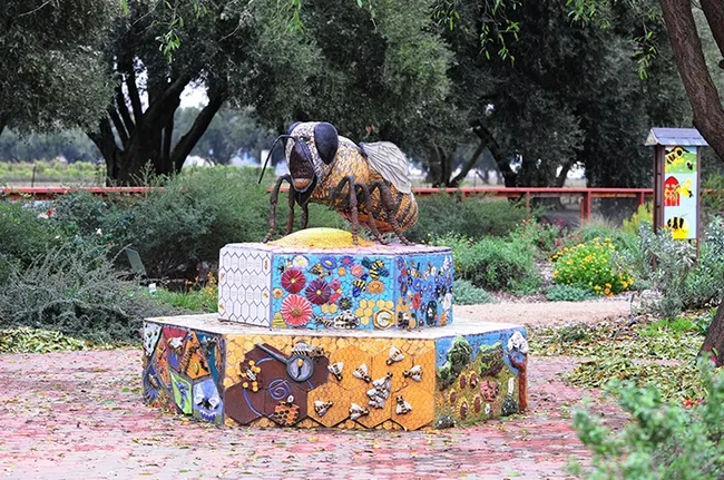 A ceramic-mosaic bee sculpture at UC Davis Bee Haven
