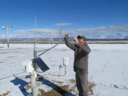 Darring checking weather station