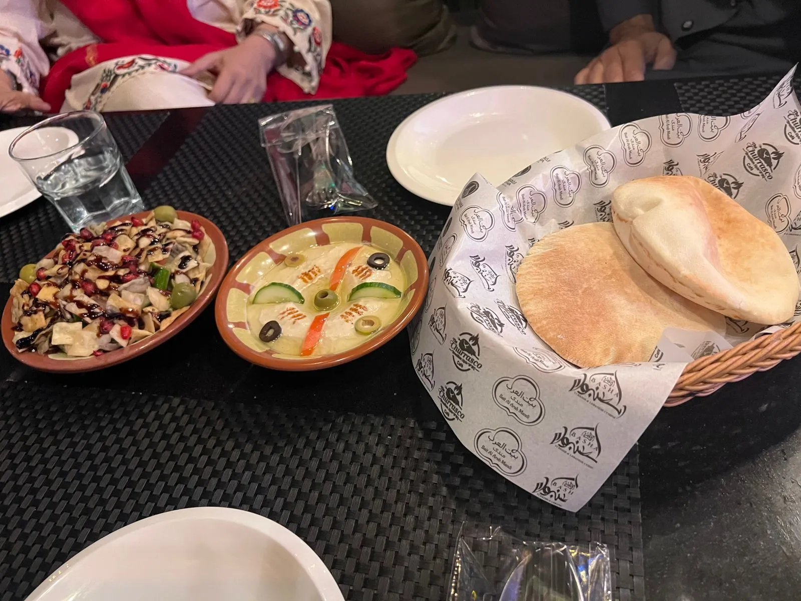 hummus and other foods for a Pakistani breakfast