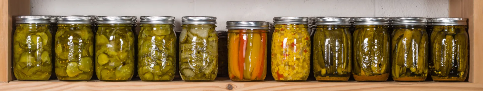 decorative header image showing a row of jars on a shelf