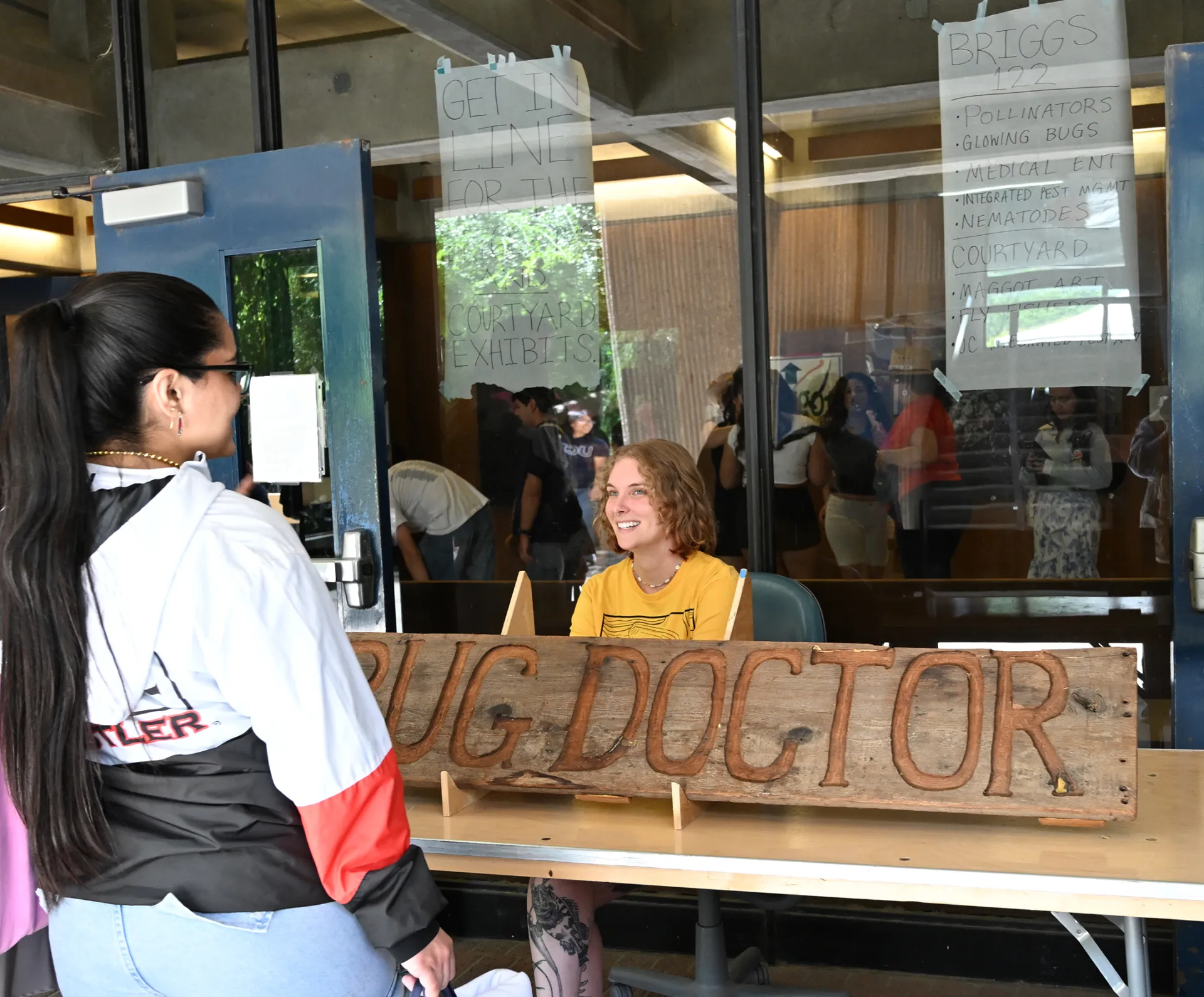 Doctoral candidate Emma "Em" Jochim of the Jason Bond lab fields a question. (Photo by Kathy Keatley Garvey)