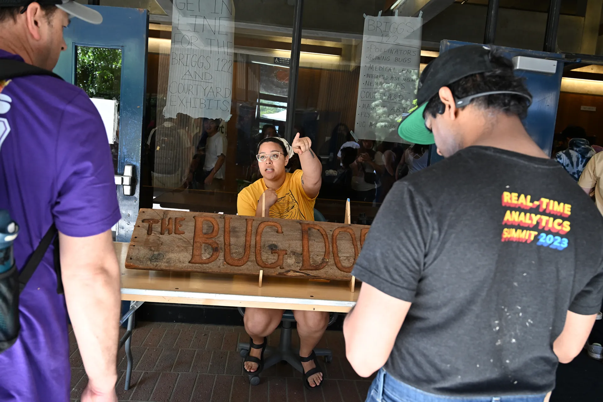 Doctoral student Iris Quayle of the Jason Bond lab answers a question. (Photo by Kathy Keatley Garvey)