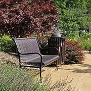 comfy chair in a beautiful garden