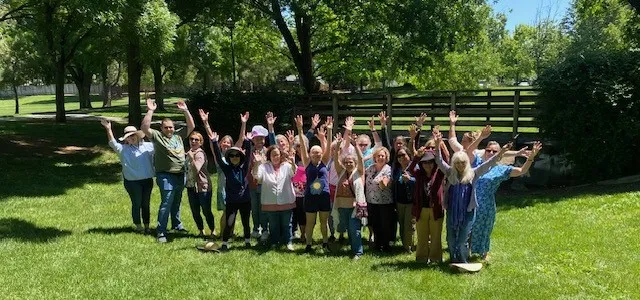 people with their hands in the air