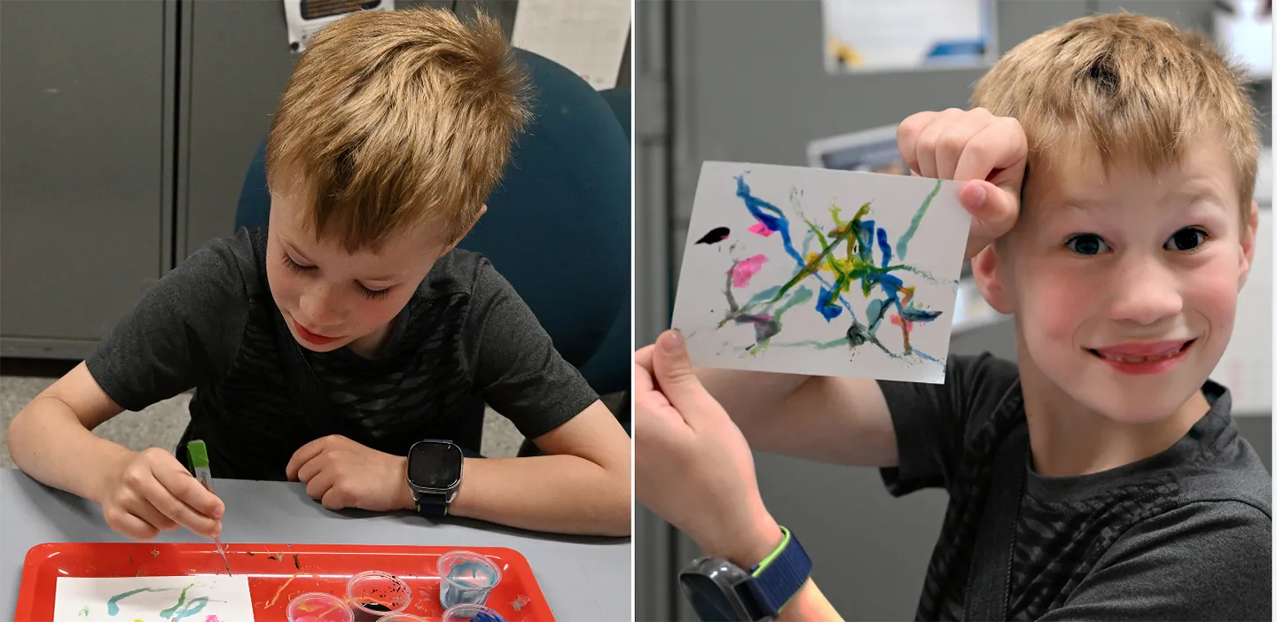 Elliot Sauder, 7, and his maggot art masterpiece. (Photo by Kathy Keatley Garvey)
