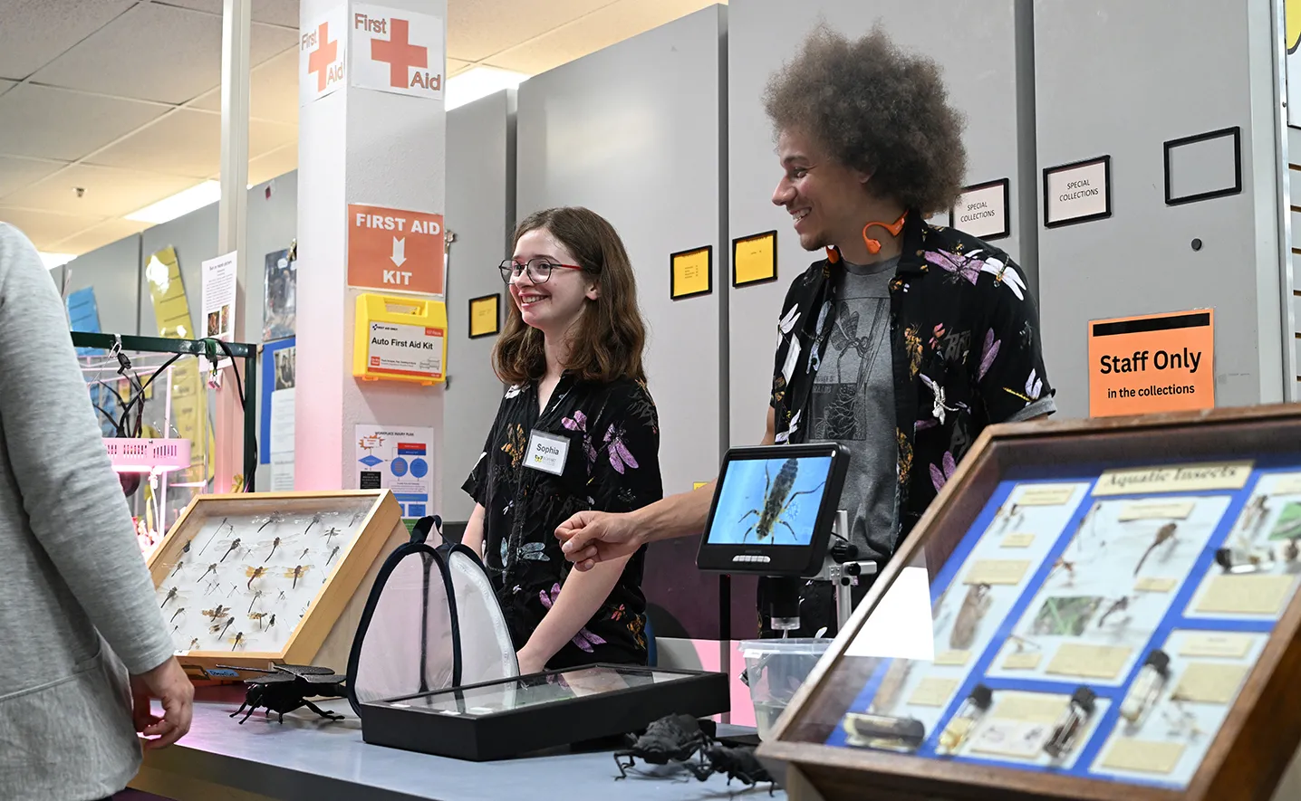 UC Davis doctoral candidate Christofer Brothers and undergraduate Sophia Phillips answering questions. (Photo by Kathy Keatley Garvey)