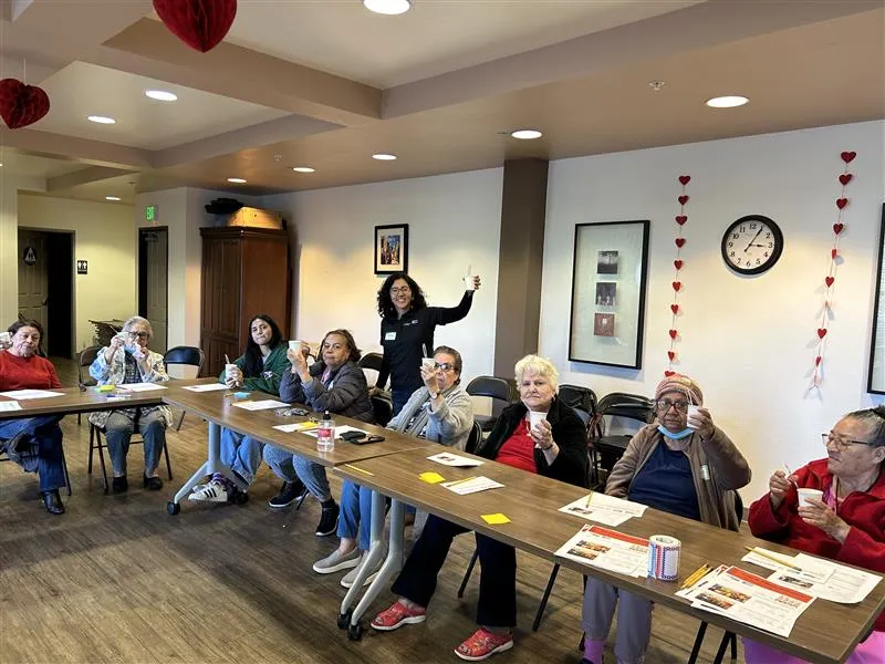 Community members at&nbsp;‘Oaks on Florence’ senior center in the city of Bell participate in a nutrition class taught by Ingrid Alarcón, a community education specialist with CalFresh Healthy Living, UC.