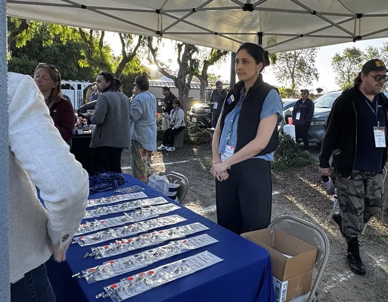 UC ANR at the booth helping people during the Agritourism Summit