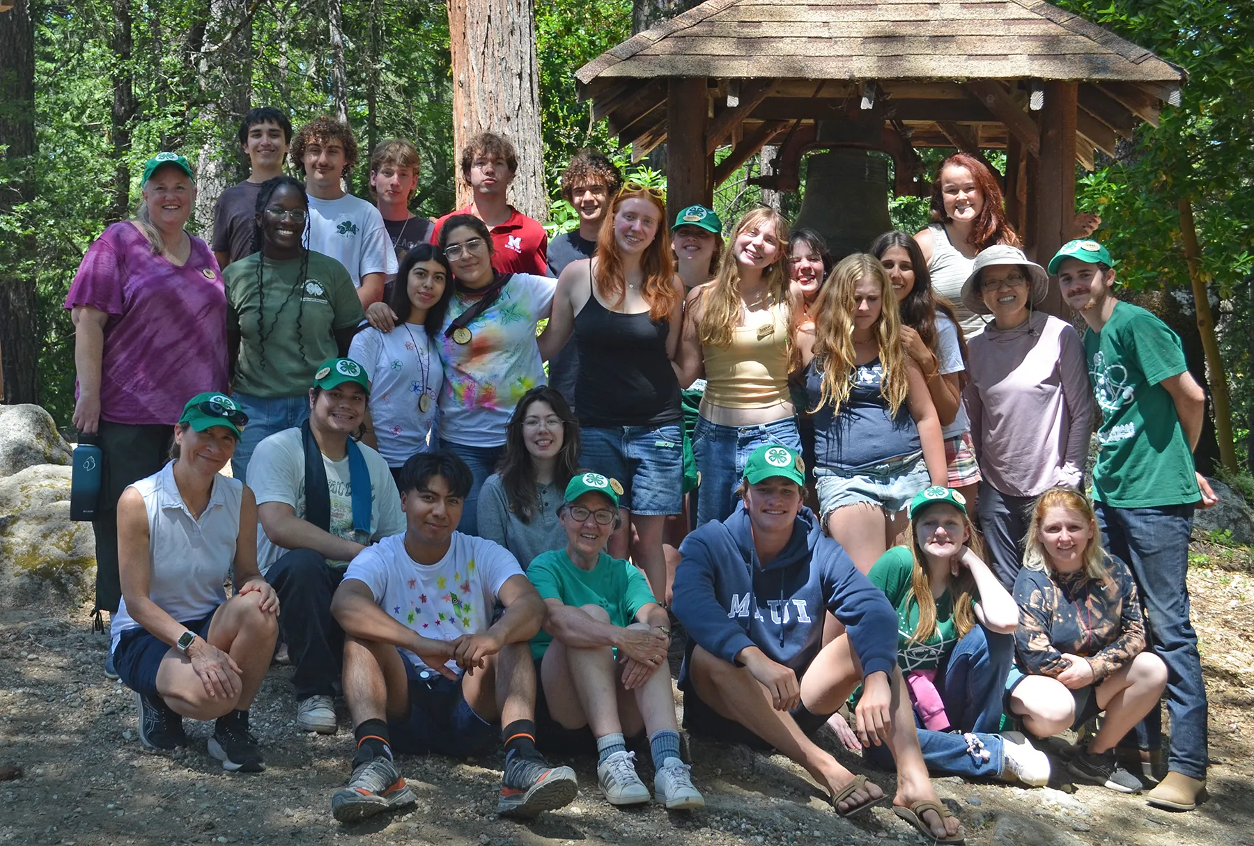 A large group of campers - youth and adults - pose