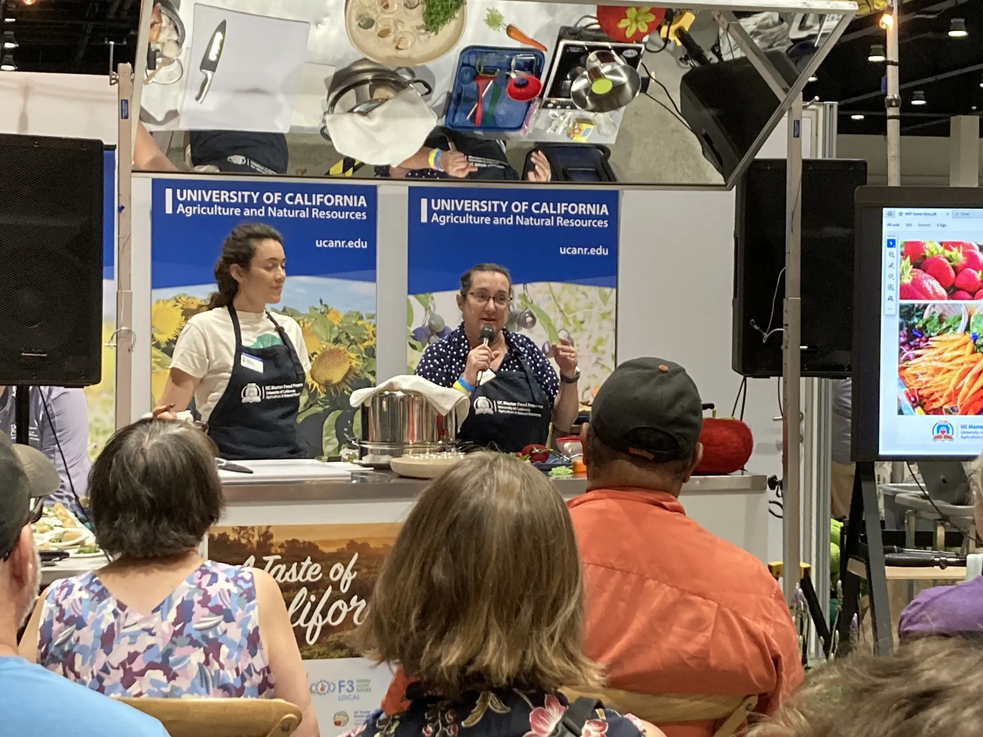 Sue Mosbacher speaks to crowd about making jam