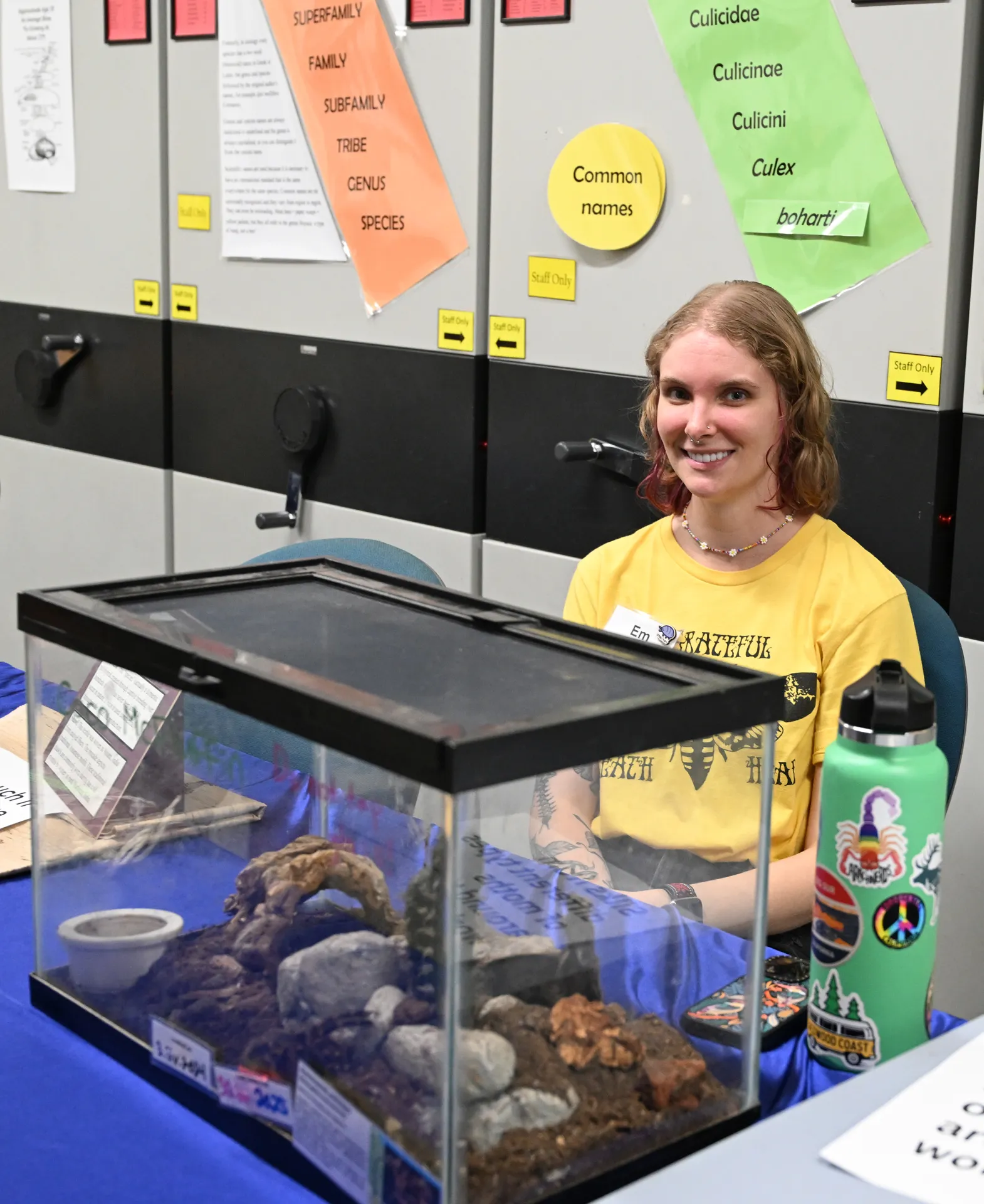 UC Davis doctoral candidate Emma "Em" Jochim of the Jason Bond lab waits for the crowd to appear at a recent Bohart Museum of Entomology open house. (Photo by Kathy Keatley Garvey)
