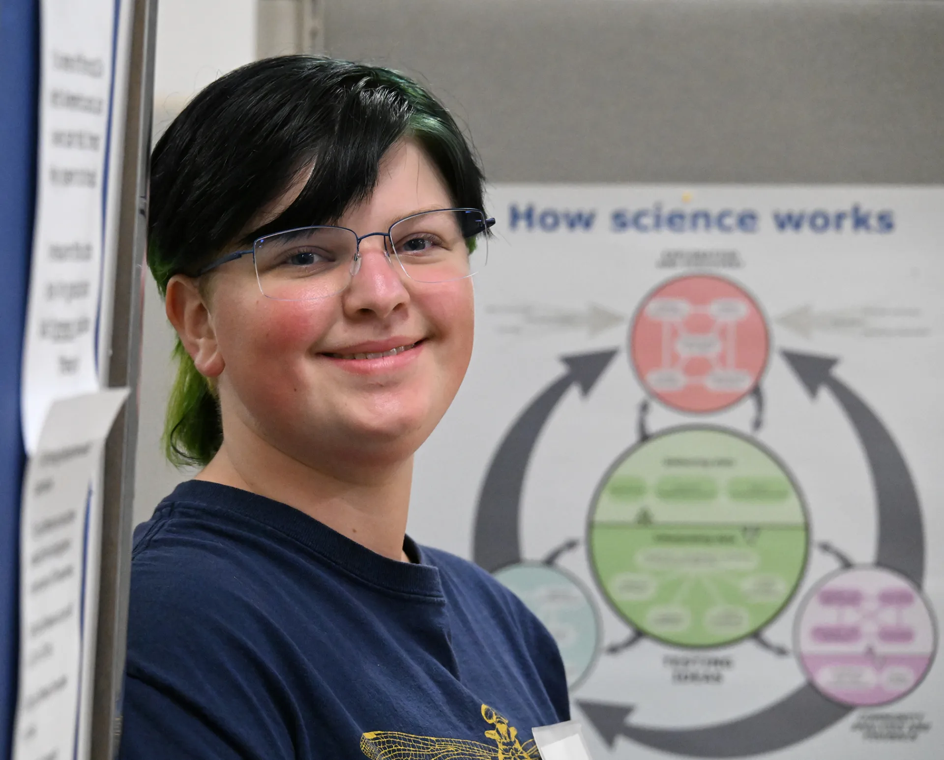 UC Davis junior Sam McCullough, vice president of the UC Davis Entomology Club, greeted visitors at the Lepidoptera collection. (Photo by Kathy Keatley Garvey)