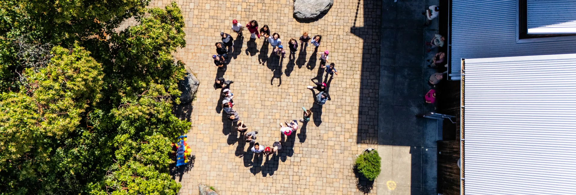 drone photo of children on Shippey patio during a school field trip