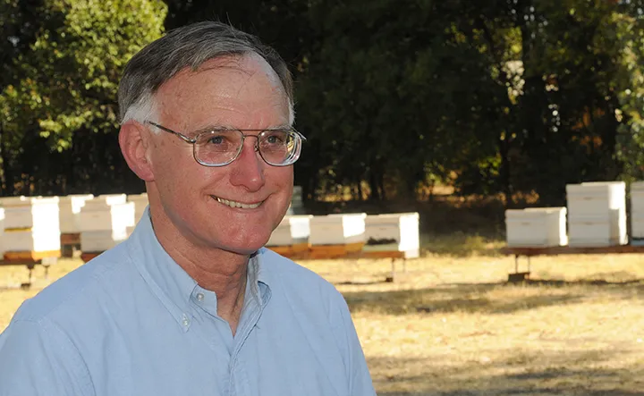 UC Cooperative Extension apiculturst Eric Mussen (1944-2022) at the apiary of the Harry H. Laidlaw Jr. Honey Bee Research Facility, UC Davis. (Photo by Kathy Keatley Garvey)