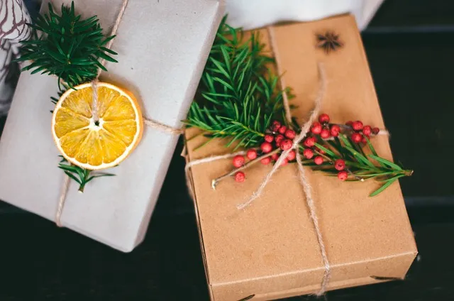 gift packages with dried lemon, greenery and twine
