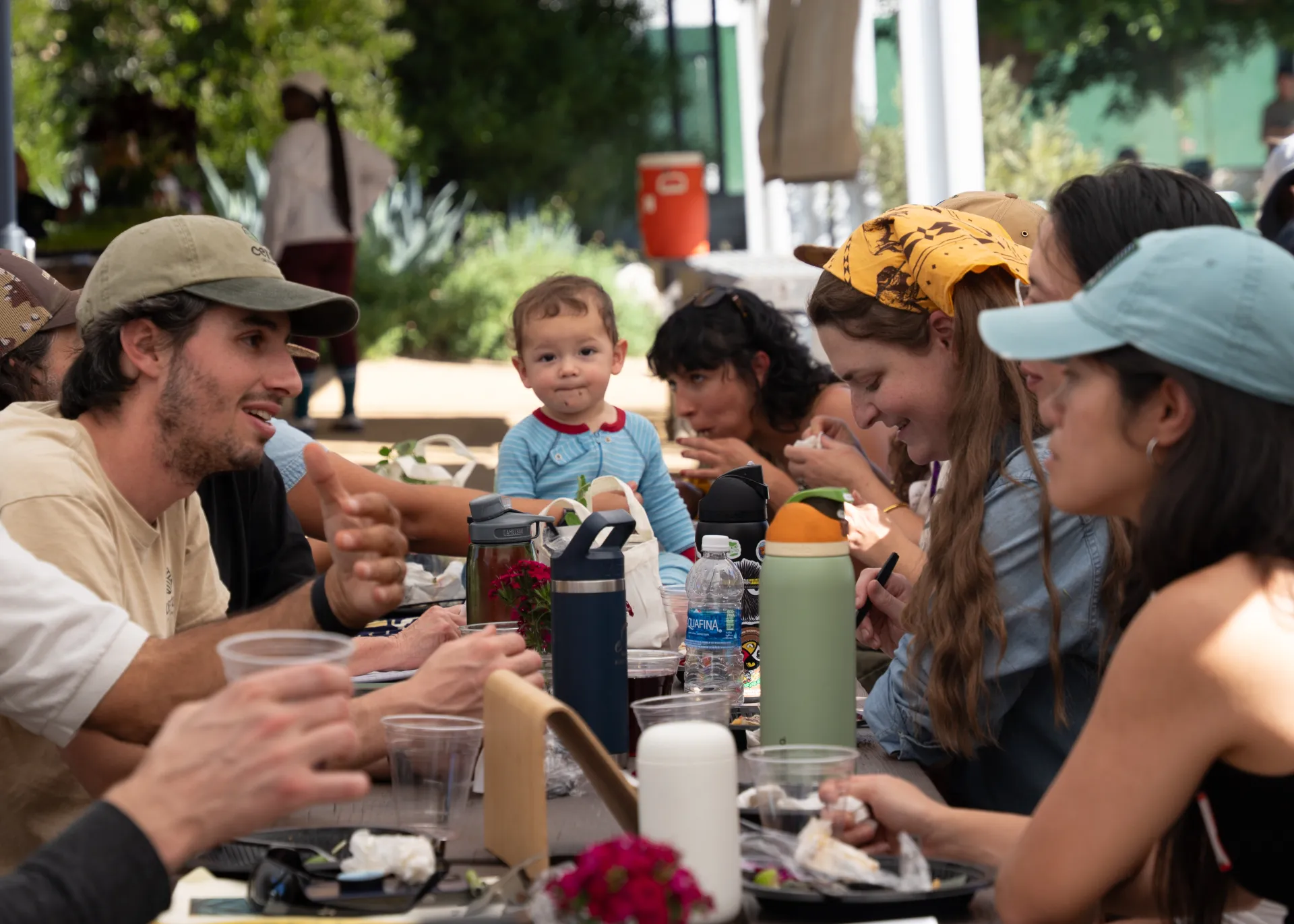 People eat lunch and talk during an agritourism workshop