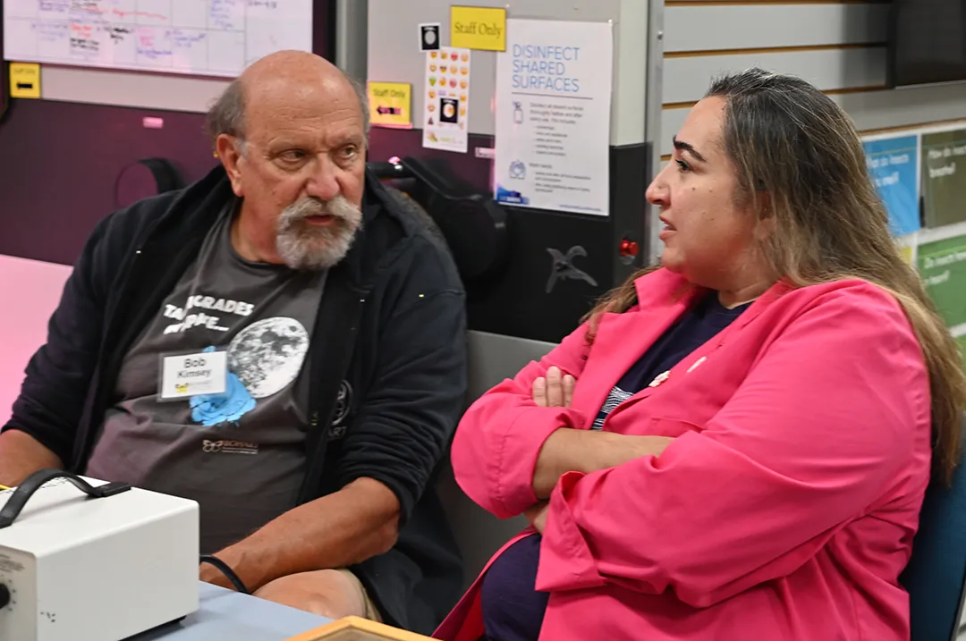 UC Davis forensic entomologist (emeritus) Robert Kimsey chats with Nazzy Pakpour at a recent Bohart Museum of Entomology open house. (Photo by Kathy Keatley Garvey)