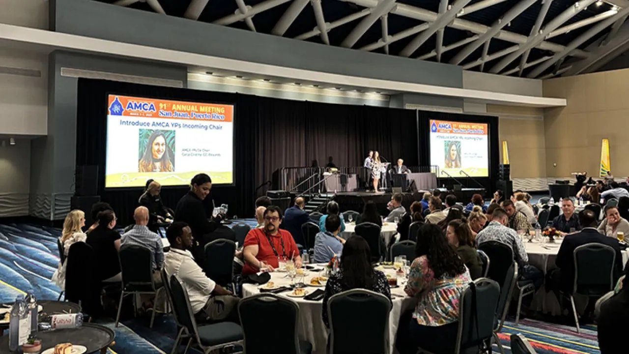An image of CC Edwards is flashed on the screen at an American Mosquito Control Association meeting.