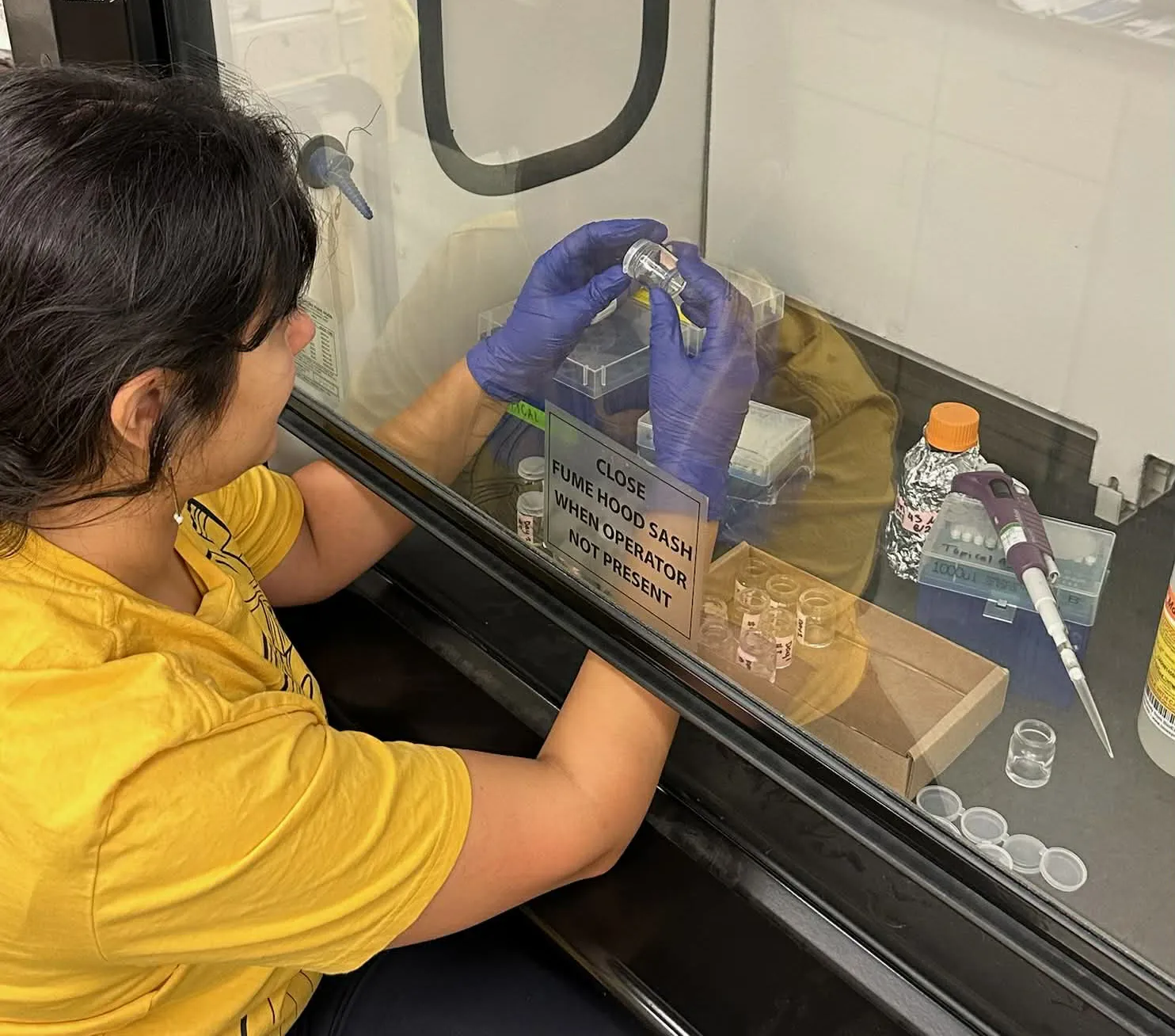 CC Edwards doing individual CDC (Center for Disease Control and Prevention) bottle assays in the lab of UC Davis doctoral alumna Tara Thiemann at the University of Pacific, Stockton. She is testing for insecticide resistance.