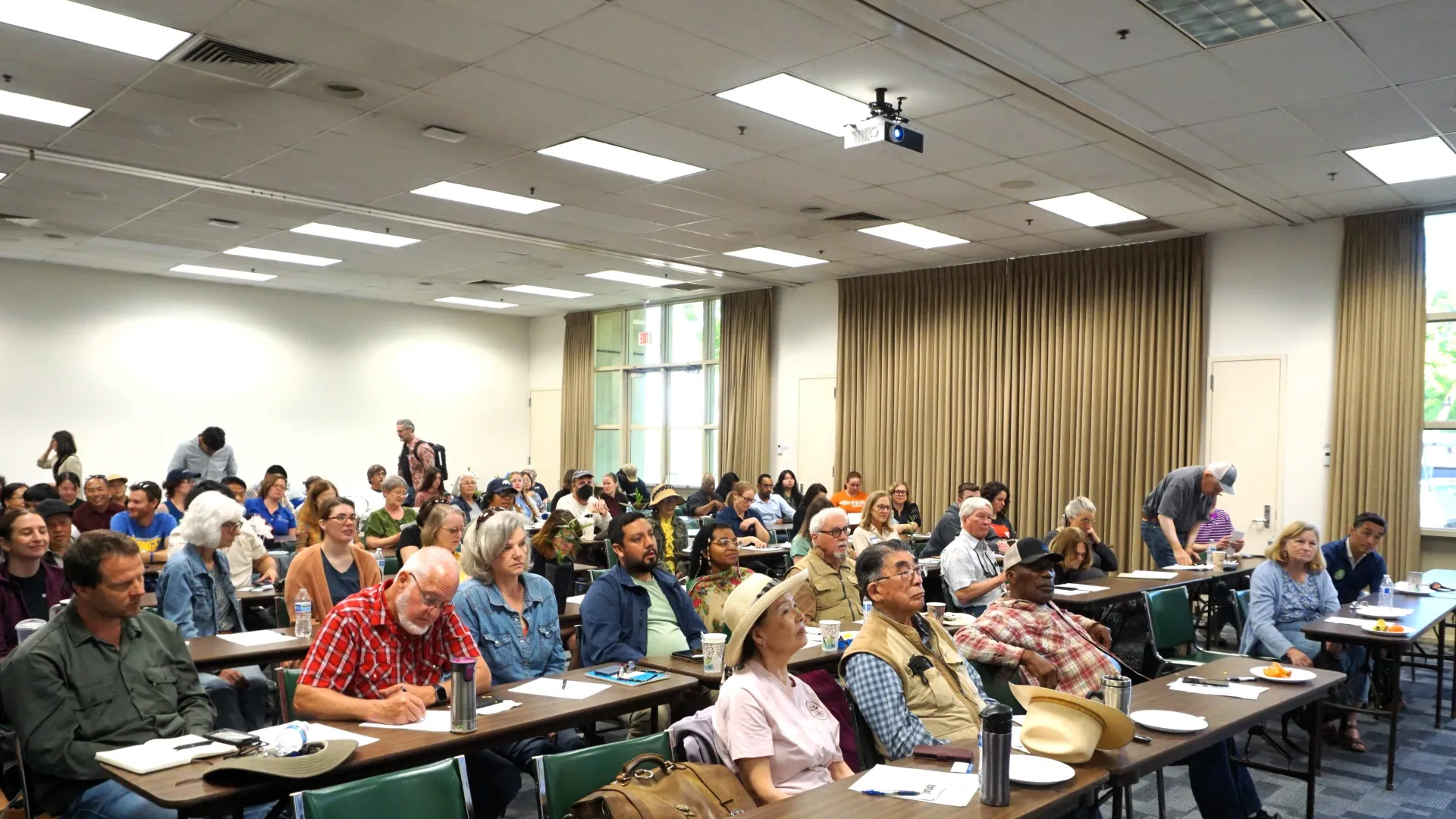 Tea Day attendees fill every seat in the room at Kearney REC to hear about the crop's potential