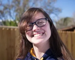 Youth smiling with corrected side light